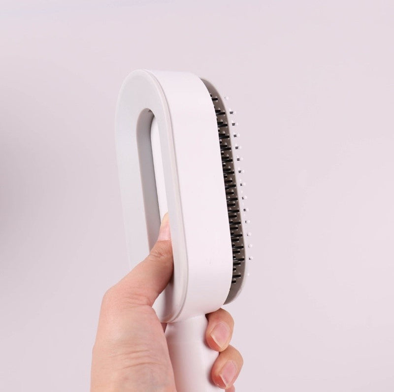 Selbstreinigende Haarbürste PURETRESS | Für alle Haartypen | Ergonomisch & Kompakt | Hygienisch auf Knopfdruck