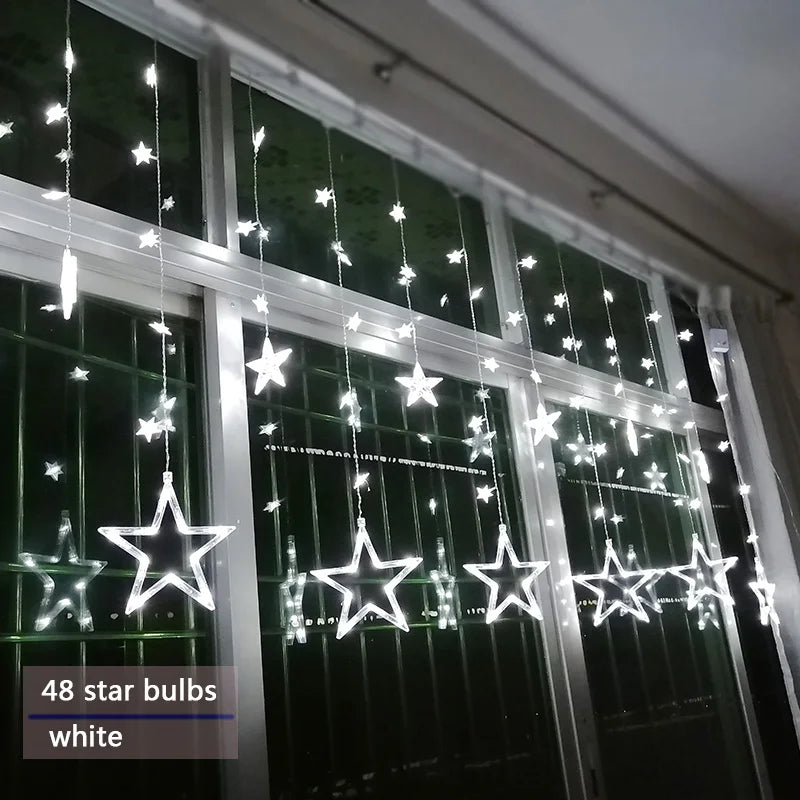 Lunessa LED Vorhanglichter Sterne | Koppelbar & Energiesparend | Für Innen & Außen | Warmweiß | Mehrere Lichtmodi