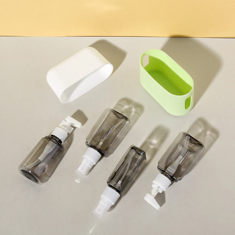 TravelEase 4-in-1 Reiseflaschen Set | Nachfüllbare 50 ml Spender & Sprühflaschen | Auslaufsicher & TSA-konform | Für Shampoo, Lotion, Desinfektion