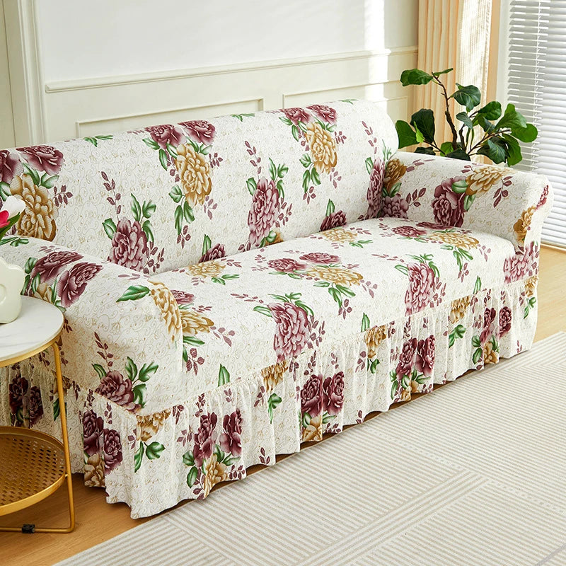 Floravelle | Sofaüberwurf mit Blumendesign | Rutschfest & Elastisch | Mit dekorativem Volant | Waschbarer Sofabezug