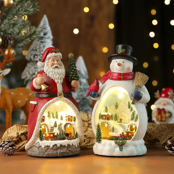 Musik-Weihnachtshaus FrostCabin | LED Weihnachtsfigur mit Musik & drehendem Zug | USB- & Batteriebetrieben | Resin Dekohaus