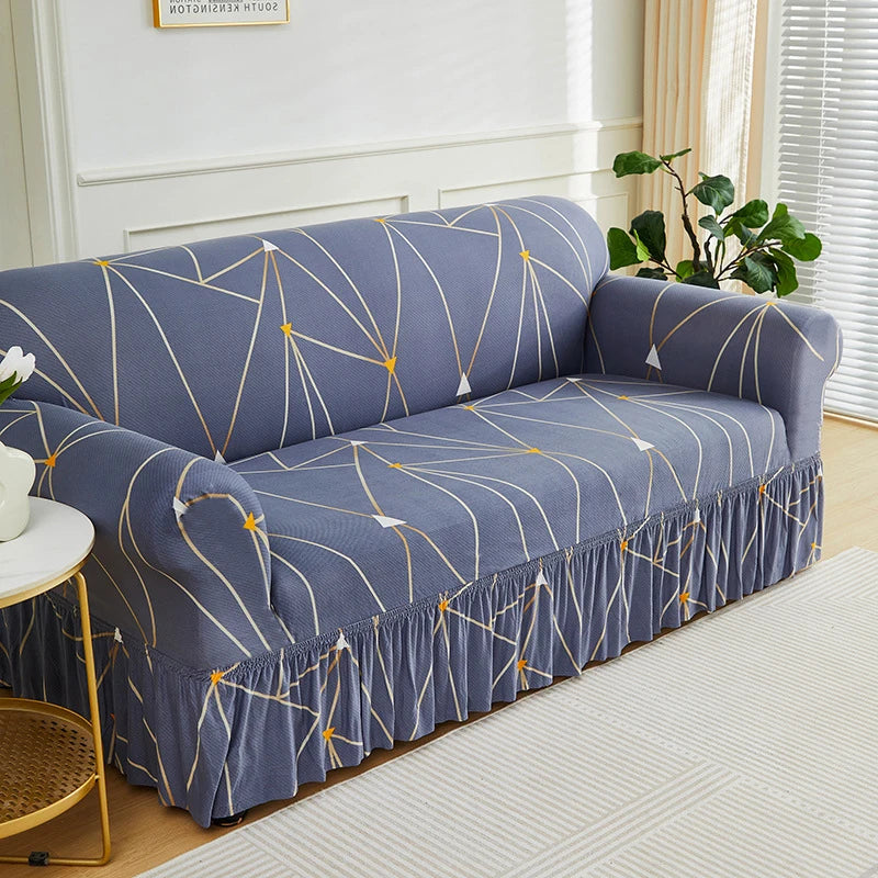 Floravelle | Sofaüberwurf mit Blumendesign | Rutschfest & Elastisch | Mit dekorativem Volant | Waschbarer Sofabezug