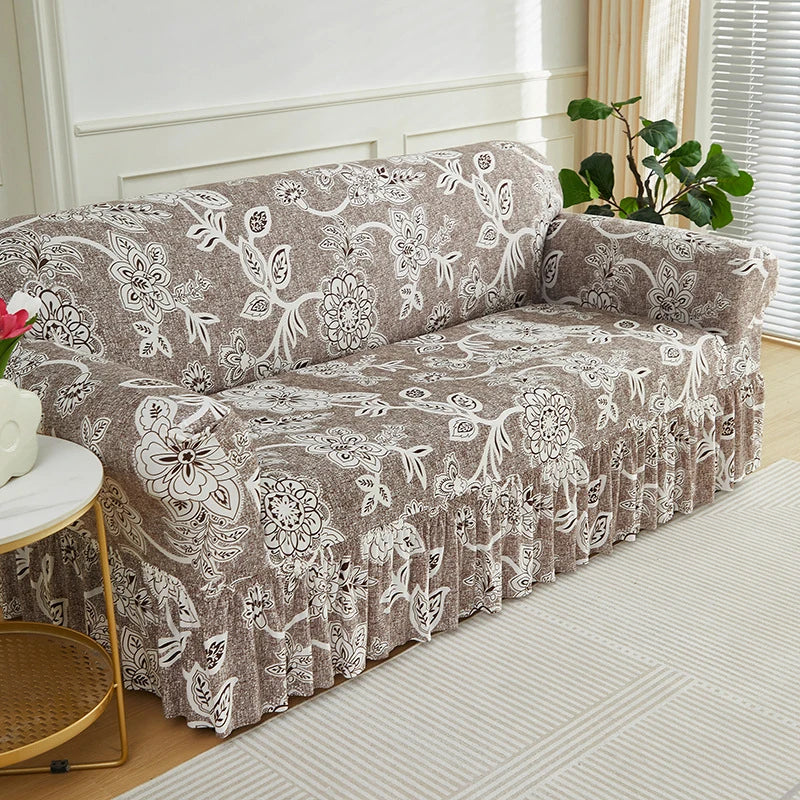 Floravelle | Sofaüberwurf mit Blumendesign | Rutschfest & Elastisch | Mit dekorativem Volant | Waschbarer Sofabezug