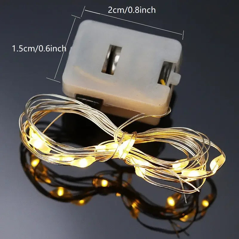 LumiGlow LED-Lichterkette 10er-Set | Warmweiß | Batteriebetrieben & Wasserdicht | Flexibler Silberdraht für Deko, Hochzeit & Party