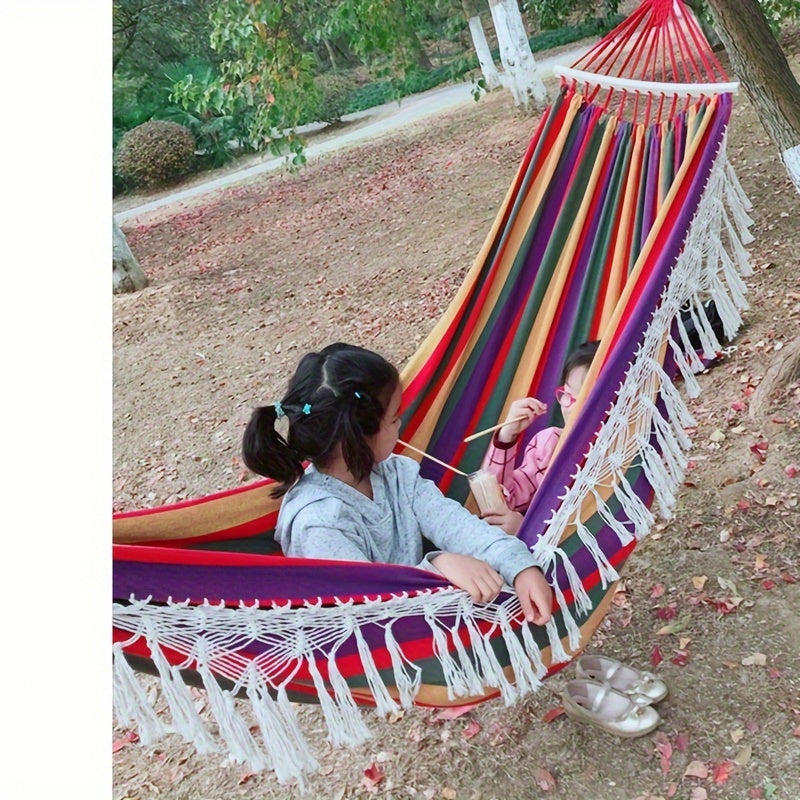 Boho-Hängematte Lunaria Breeze | Mit Pompons & Streifen | Baumwolle | Für 2 Personen | 43–54 kg Tragkraft